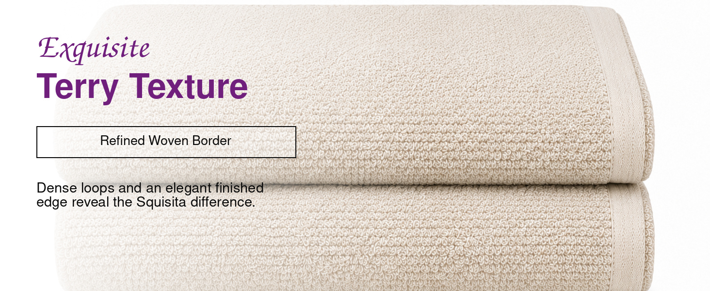 Squisita Champagne Zero Twist cotton bath towels displayed in a bright modern bathroom