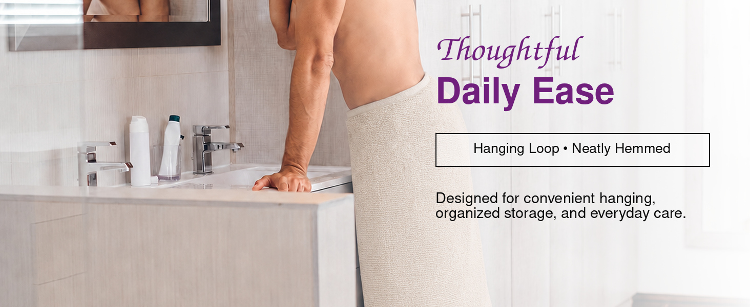 Violet Linen Squisita Champagne bath towels arranged in a calm, coordinated bathroom